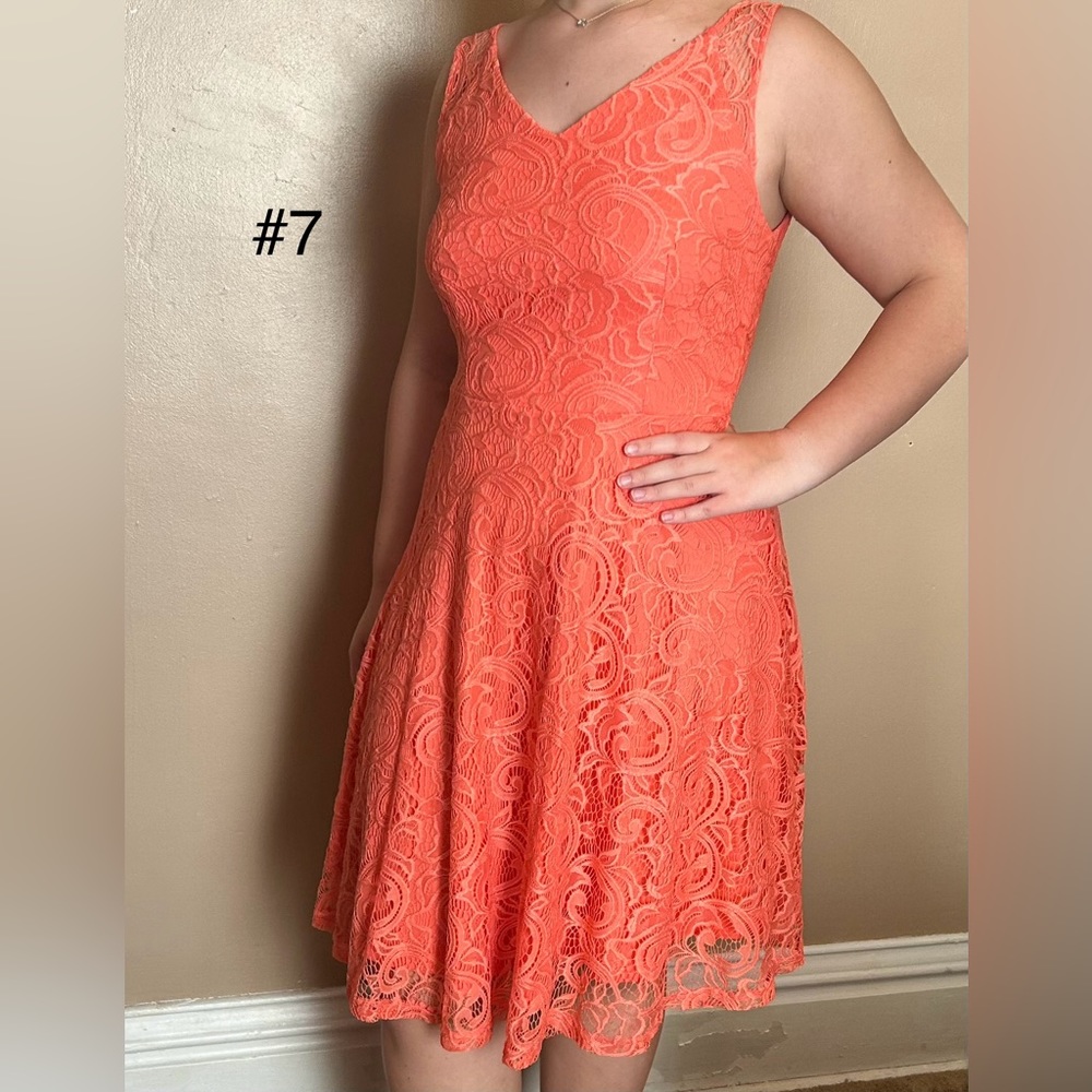 Dark coral A-line dress with lace overlay; knee length, sleeveless, zipper back